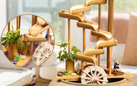 风水摆件荐析：山主人丁，水主财，风水轮转动福运来。